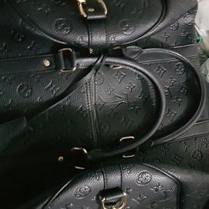 Louis Vuitton Keepal Bandouliere Carry Bag